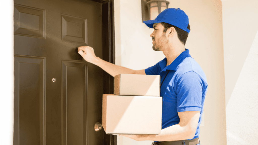 A delivery driver knocking on a door, attempting to deliver a package. If homeowner doesn't answer, this could result in a delivery exception by way of a missed delivery